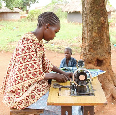 Woman-sewing-Uganda-Kleos-Microfinance-Group-Studio-15